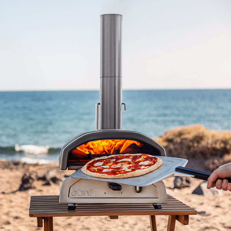 Ooni Fyra 12 Wood Fired Pizza Oven cooked beach