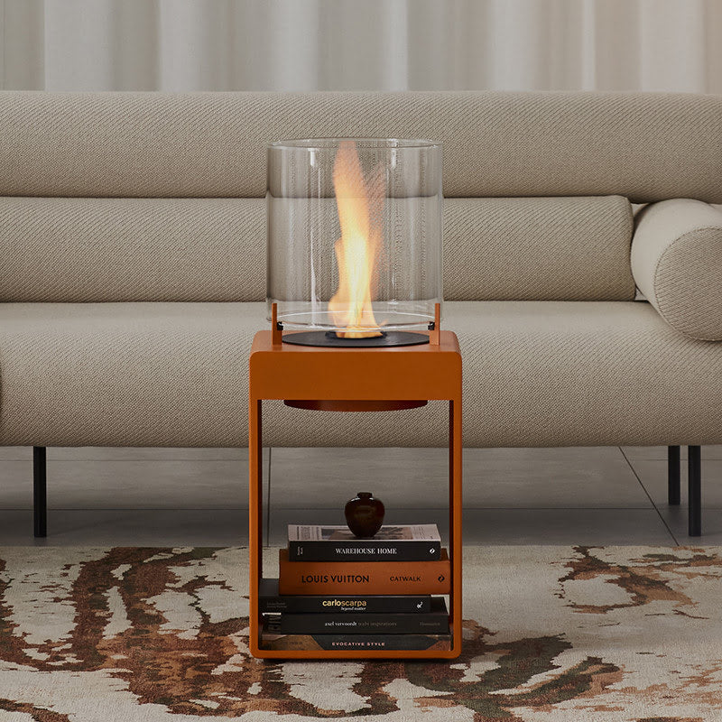 Pop 3T Tall Ethanol Fireplace orange in living room